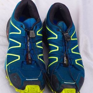 Mens Salomon running shoes. Slightly used. Some tread left. Look pretty new,.